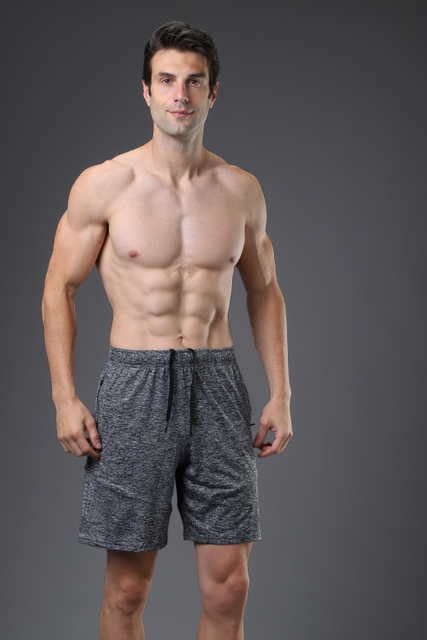 A ginástica respirável ostenta shorts para homens de altura dos homens de compressão de shorts de compressão rápida esportes secos